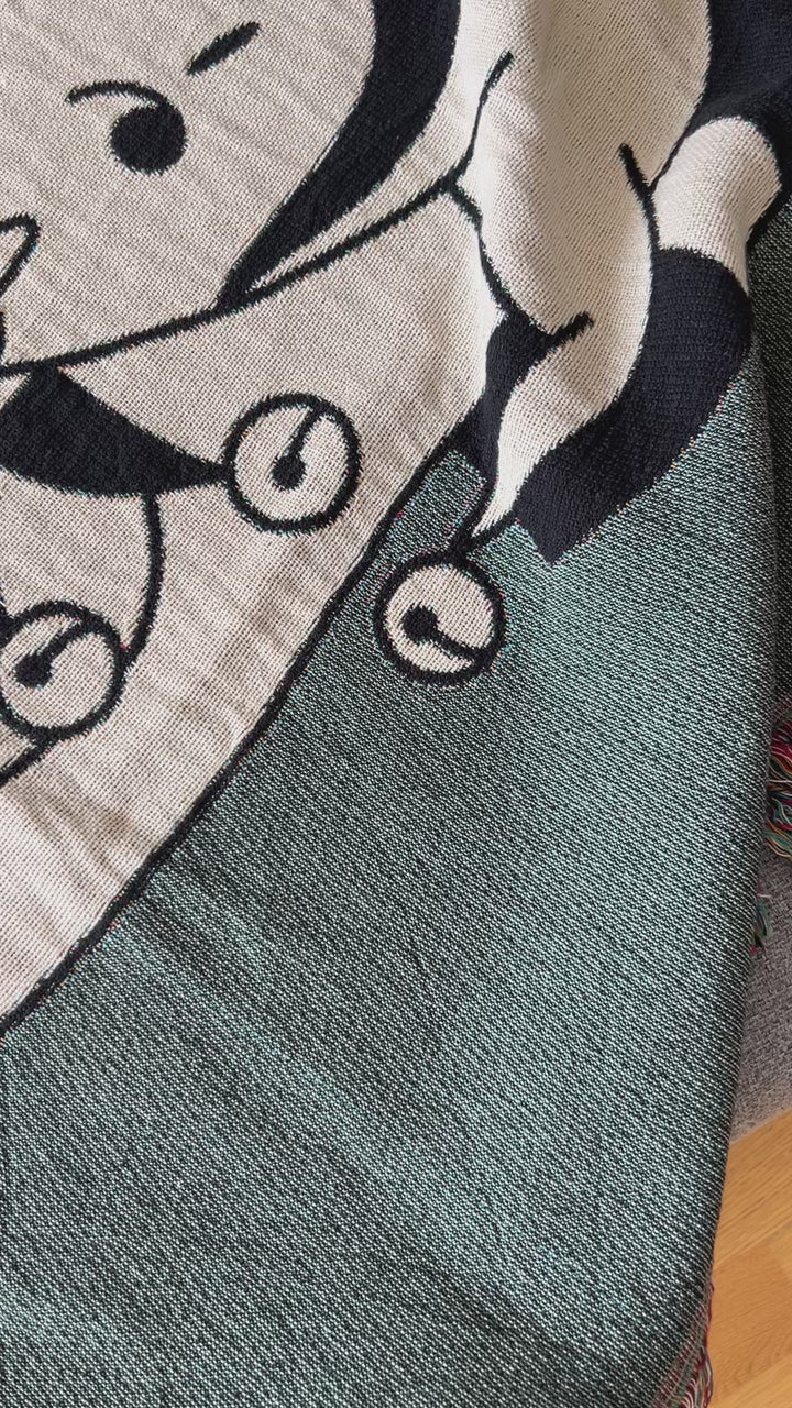 Close-up of the jacquard weave on the clown blanket